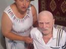At age 101, Viktor Sokolov, with an unidentified caretaker or relative, sings a Russian song.
